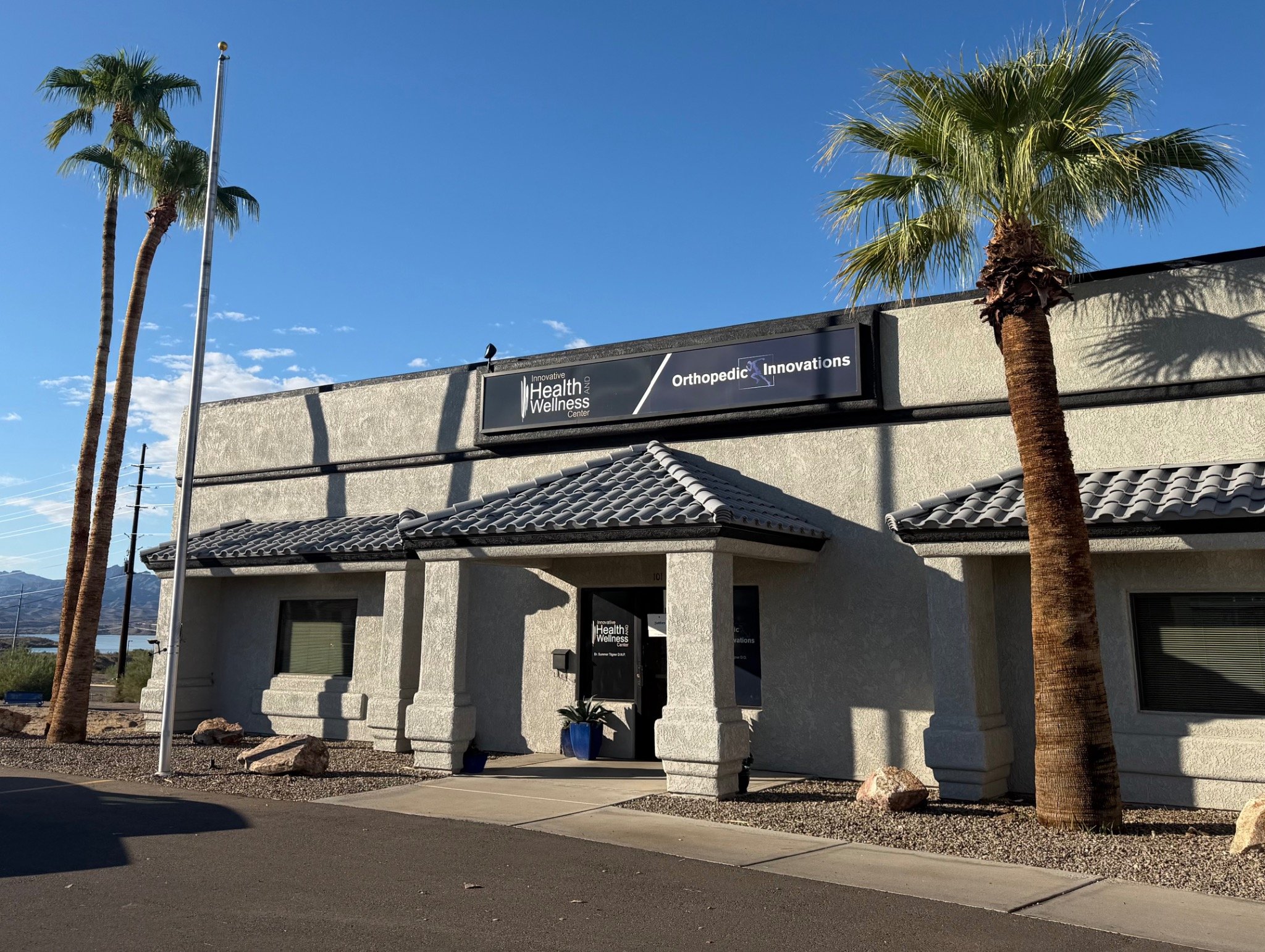 Temporary clinic entrance beneath the Orthopedic Innovations sign, Suite 101